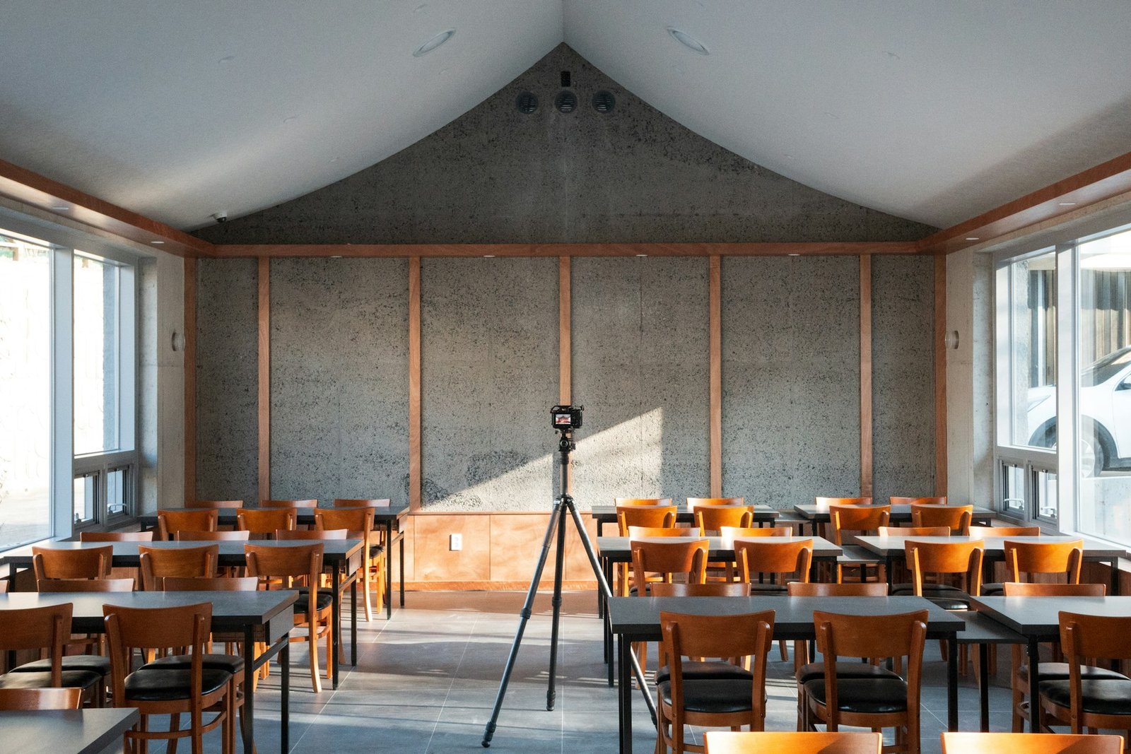 Bright classroom with tables and chairs